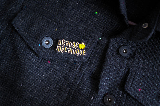 Broche Orange Mécanique